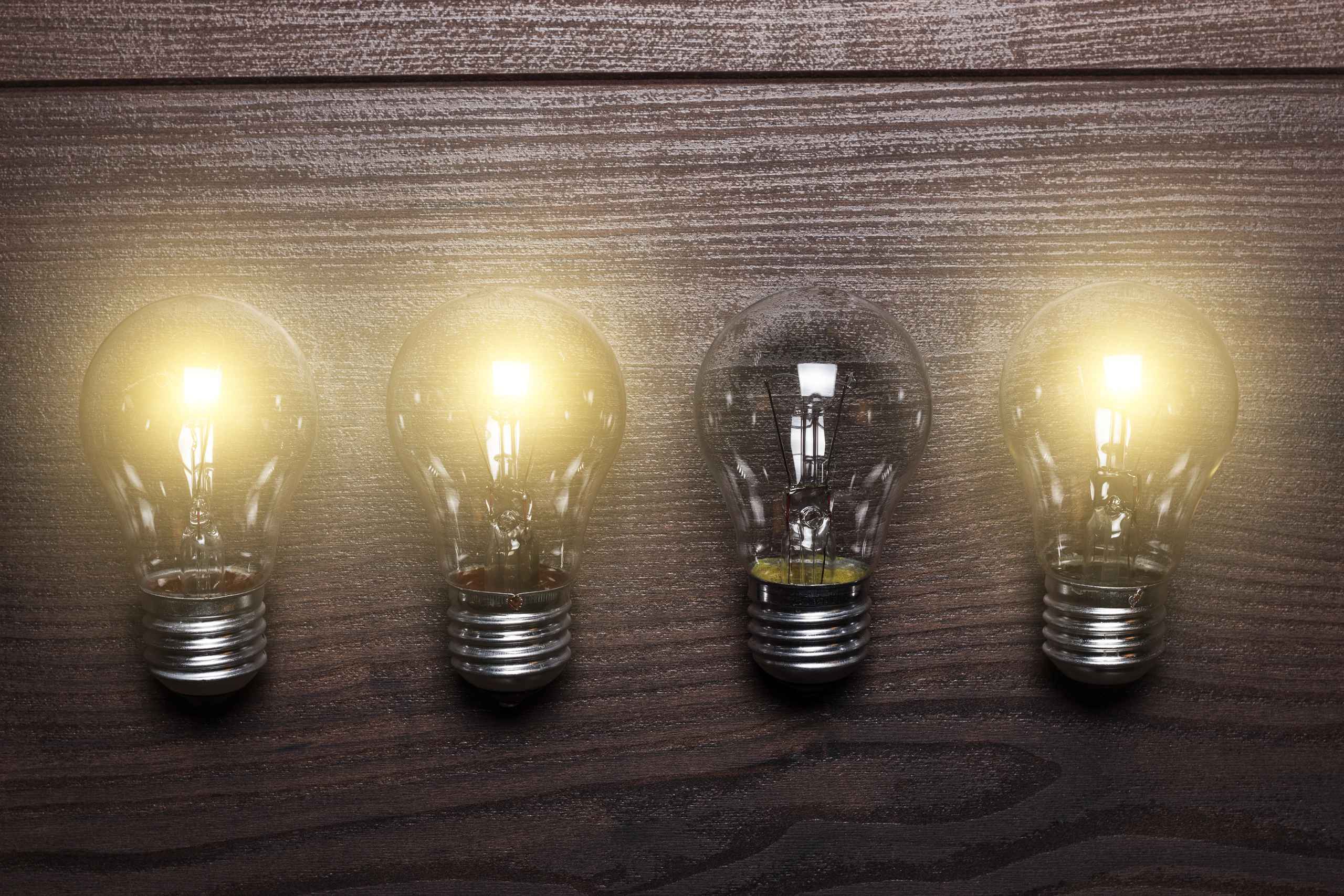 4 light bulbs, one off
